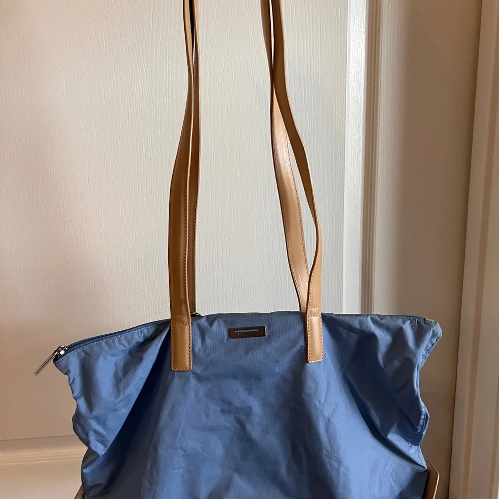 Tumi light blue